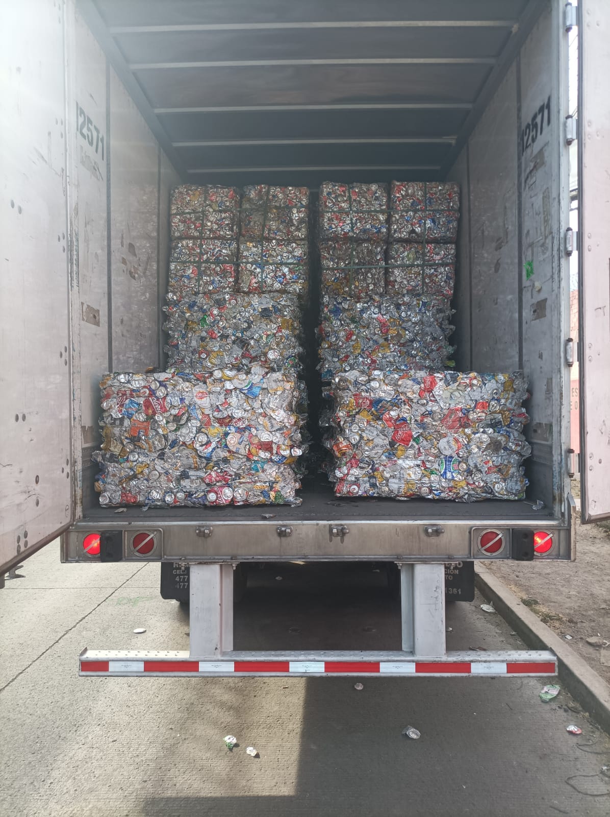 Aluminium UBC bales loaded in trailer — SIDELL Scrap Metal